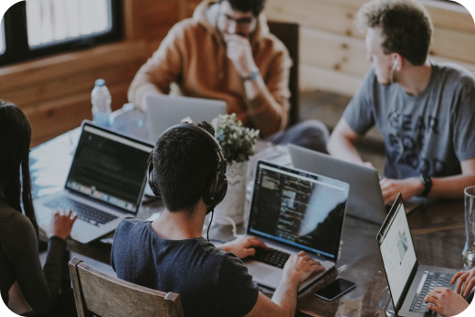 People working on common desk